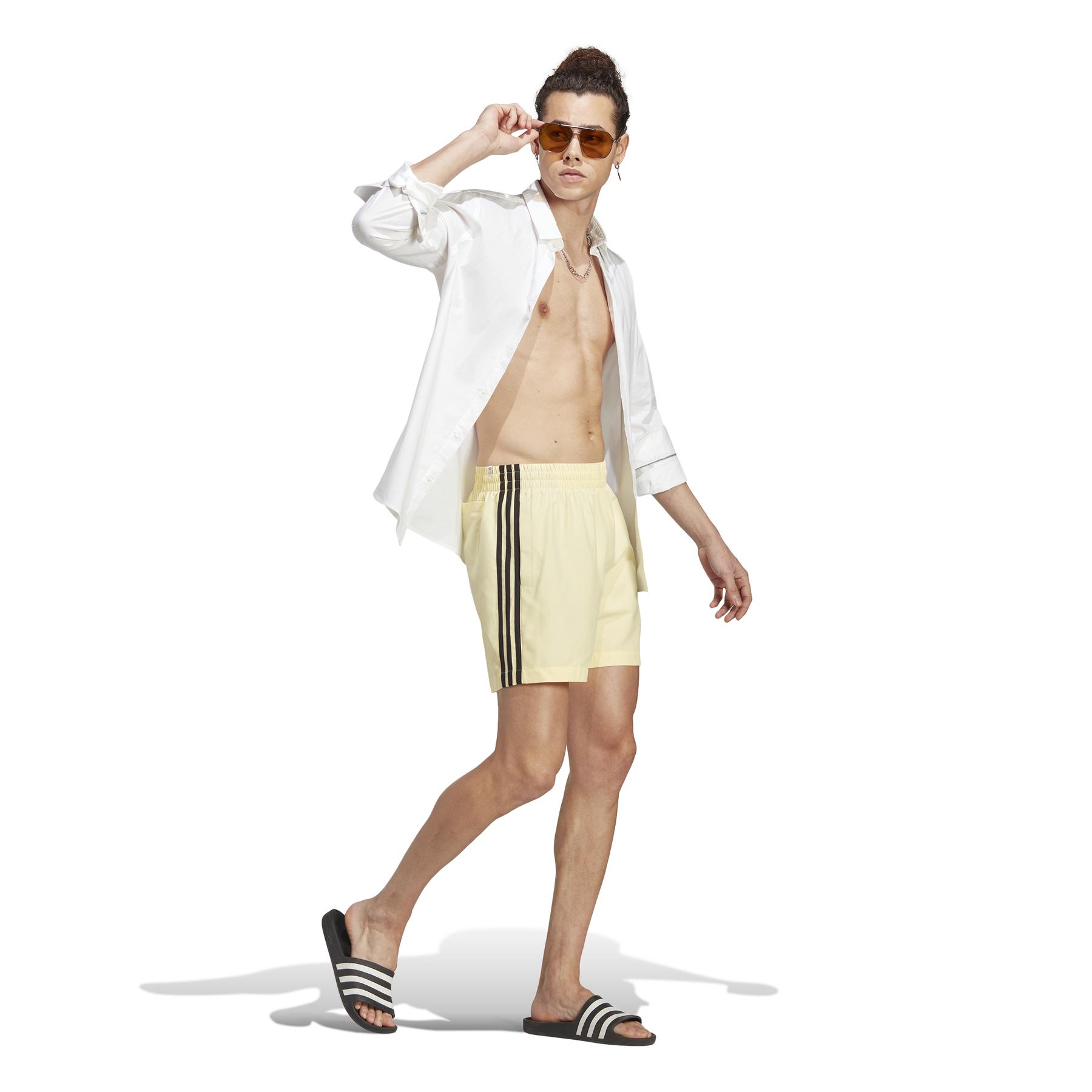 product/a/d/adidas_ht4410_5_apparel_on_model_walking_view_white_xo.jpg